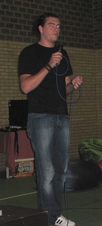 Photo of student with microphone.